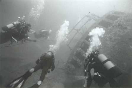 Divers on the wreck of the James Barrie in Scapa Flow, UK