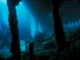 Divers inside the hold of the Tabarka wreck, Scapa Flow