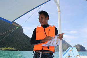 Snorkel Guide Giving Environmental Briefing - Photograph by The El  Nido Foundation