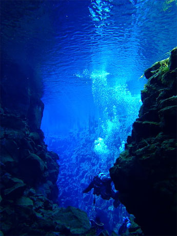 Diving Silfra, in the ravine between the American and European tectonic plates. Public domain https://commons.wikimedia.org/wiki/File:SCUBA_Silfra.jpg