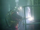 Diver retrieving nuclear waste
